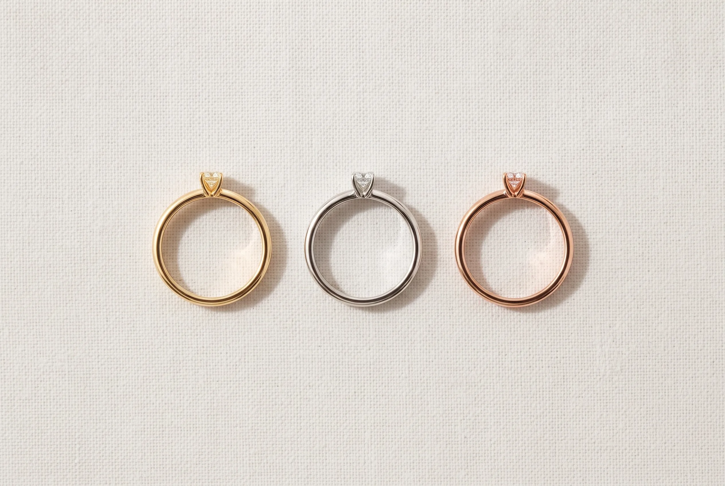 One design shown in yellow, white and rose gold.